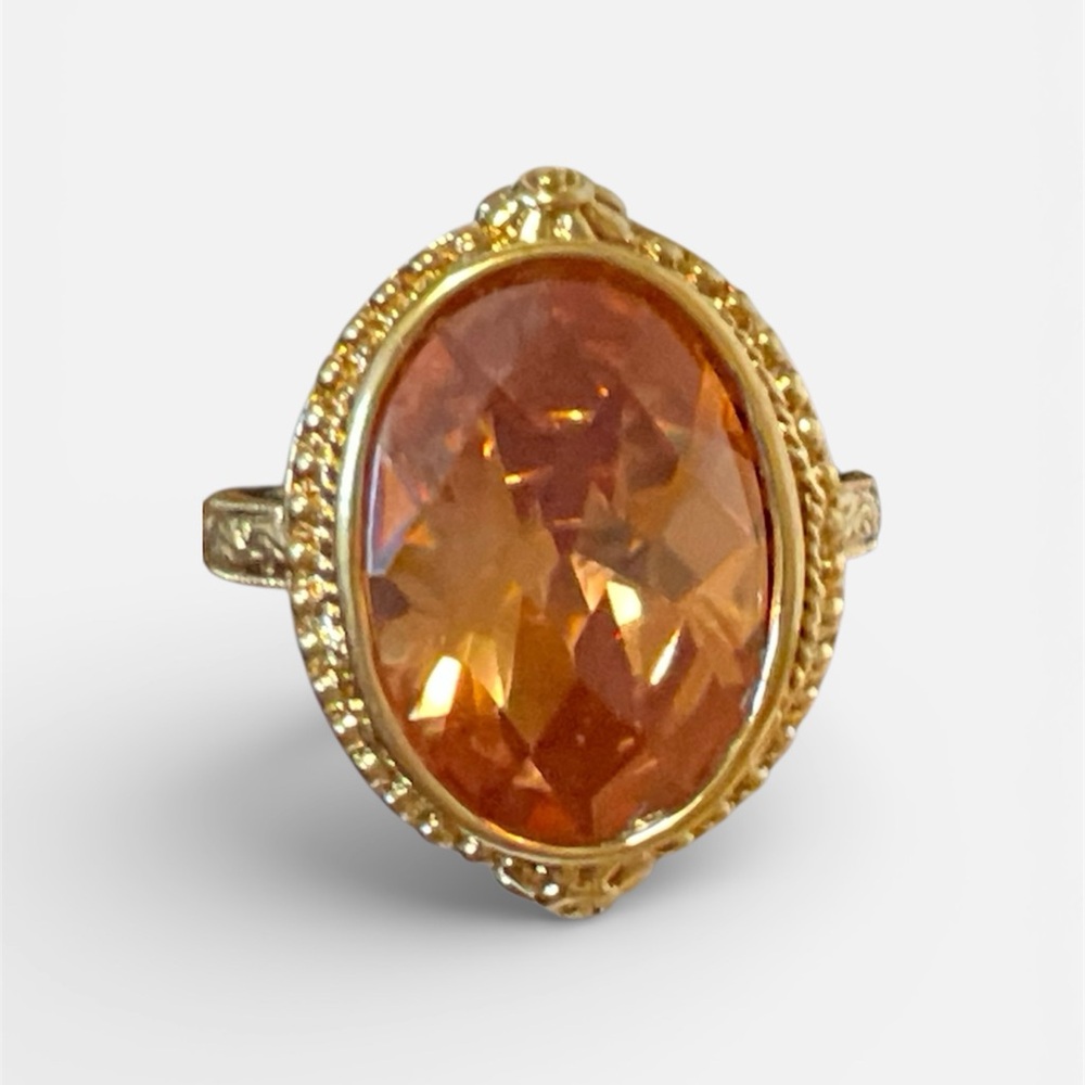 Radiant Gold Ring with Orange Gemstone
